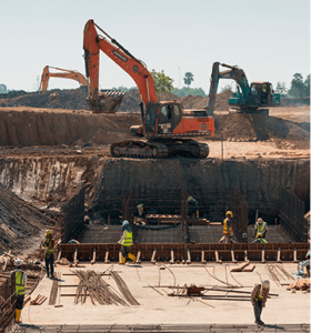 heavy-machines-construction-workers-working-building